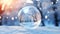 A large glass ball reflecting a winter landscape on a snowy winter background