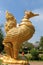 Large golden bird statue