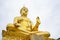 The large golden Buddha statue stands tall and stands out and is respected by Buddhists. Is the thing that holds many people`s