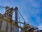 Large grain silo`s with blue sky background