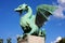 Large green Dragon bridge statue in Ljubljana, Slovenia