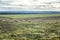 Large green field. Beautiful view from above. Endless space