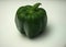 Large green fruit of sweet pepper. Photo on a white background