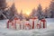 Large group of Christmas gifts with red ribbons on snow covered surface.