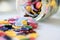 Large Group Of Colorful Plastic Sewing Buttons On Table