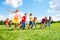 Large group of kids running in the park