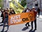 Large group of people protesting with a large "Just Stop Oil" banner