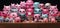 A large group of pink and black stuffed animals. Generative AI image.