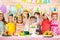 Large group of preschool kids celebrating birthday party