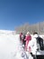 Large group of snowshoe hikers