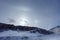 Large halo around the sun on a winter day in mountains. Hasaut v