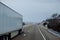 Large heavy freight truck speeding through Arizona desert