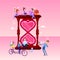 A large hour glass shaped like a heart and tiny people around. pink romantic template. flat design style vector graphic