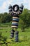 Large human looking sculpture made of tires