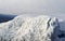 A large iceberg will break into pieces. View from above