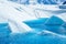 Large icebergs in blue pool on the Matanuska Glacier