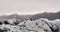 Large icebergs detached from the tongue of a glacier reaching the coast, in Iceland, paradise for adventurers