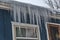 Large Icicles Hanging From a Roof