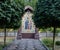 Large icon of the Mother of God, among the trees, on a warm day