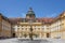 The large, impressive courtyard of the Melk Abbey in Upper Austria has a fountain at its center.