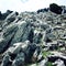 Large inclined boulders. Aged photo. Valley near Tahtali Dagi Mountain, Turkey.