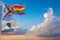 large Inclusive Progressive lgbt Pride flag and flag of Massachusetts state, USA waving at sky. Freedom and love, activism,