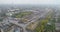 Large industrial area top view. Industrial complex aerial view. Gantry cranes and trucks near a large warehouse