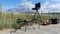 Large industrial commercial drone with monitor on stand in the countryside