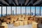 Large industrial urban warehouse with large pile of cardboard moving boxes in front of Skyline, conceptual 3D Illustration