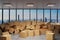 Large industrial urban warehouse with large pile of cardboard moving boxes in front of Skyline, conceptual 3D Illustration