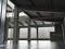 Large Interior grunge framed warehouse with an empty floor