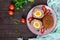 Large juicy cutlets stuffed with boiled egg on a dark wooden background