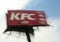 A large KFC bilboard nearby from Munich, dynamic intentational motion blured photo