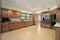 Large kitchen with wood cabinetry