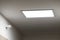 Large led lighting panel on the ceiling in a modern residential complex. Power saving. Motion sensor. Lighting in non-residential