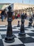 Large, life-sized king and queen chess pieces