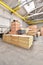 Large and light warehouse, cargo storage in wooden boxes