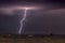 Large lightning strike at dusk on Tornado Alley