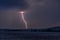 Large lightning strike at dusk on Tornado Alley