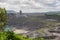 Large limestone quarry in Clitheroe, Ribble valley. Excavators and trucks working