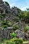 Large limestone rock formations in Daisekirinzan park in Okinawa