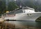 Large Luxury Cruiser Anchoring In Eidfjord Surrounded By Big Mountains