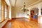 Large luxury dining room interior with kitchen and arch.