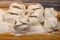 Large manta rays with beef on a wooden Board with flour on the table. Close up