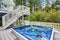 Large marine style home with two level deck. Jacuzzi view