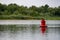 Large metal bright buoy on the river in the Rostov region. Designation of the depth and limit of movement for navigation of water