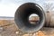 Large metal stainless steel overpass pipe for aggressive environments. Construction of a large industrial trunk overpass