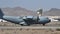 Large military transport plane rolls onto the runway after landing