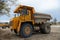 Large mining dump truck. Transport industry. Extraction of stone in an open pit