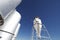 Large modern farm grain silos with blue sky